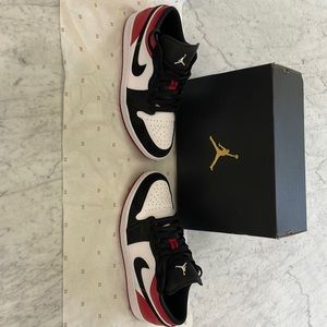 Like new! Worn inside house only 2 times for special occasion. Air Jordan 1 Low!